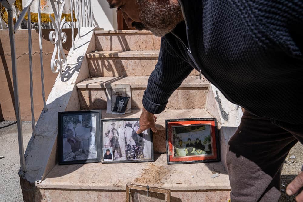 Semra Karaca, Sultan Kodaş, Hüseyin Kodaş and Şengül Kodaş (from left to right) live together as a family in Ören village, on the outskirsts of Malatya, Türkiye. They have been greatly affected by the recent earthquakes, as well as heavy flooding in the region.
"There are earthquakes on the one hand and rain on the other. We don’t know what will happen in the future. I’m here with my wife, my siblings, my children, and my mother.
Our belongings are drowned in water because of the flood, we can't find anything to wear, the neighbour brought us these clothes for now. We were staying in a tent, but the tent got flooded too.
We are now trying to dry what we took out of the house, including our family photos.
The children are scared. The situation is very dire”, says Hüseyin Kodaş.