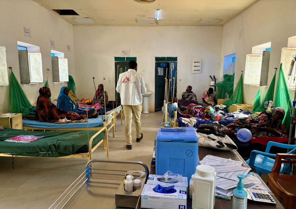 An MSF nurse walks through the Inpatient Therapeutic Feeding Centre (ITFC), a ward that treats children with severe malnutrition at Rokero Hospital in Central Darfur.